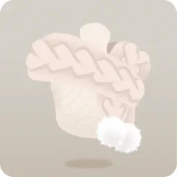 ポンポン付き編み込みマフラー